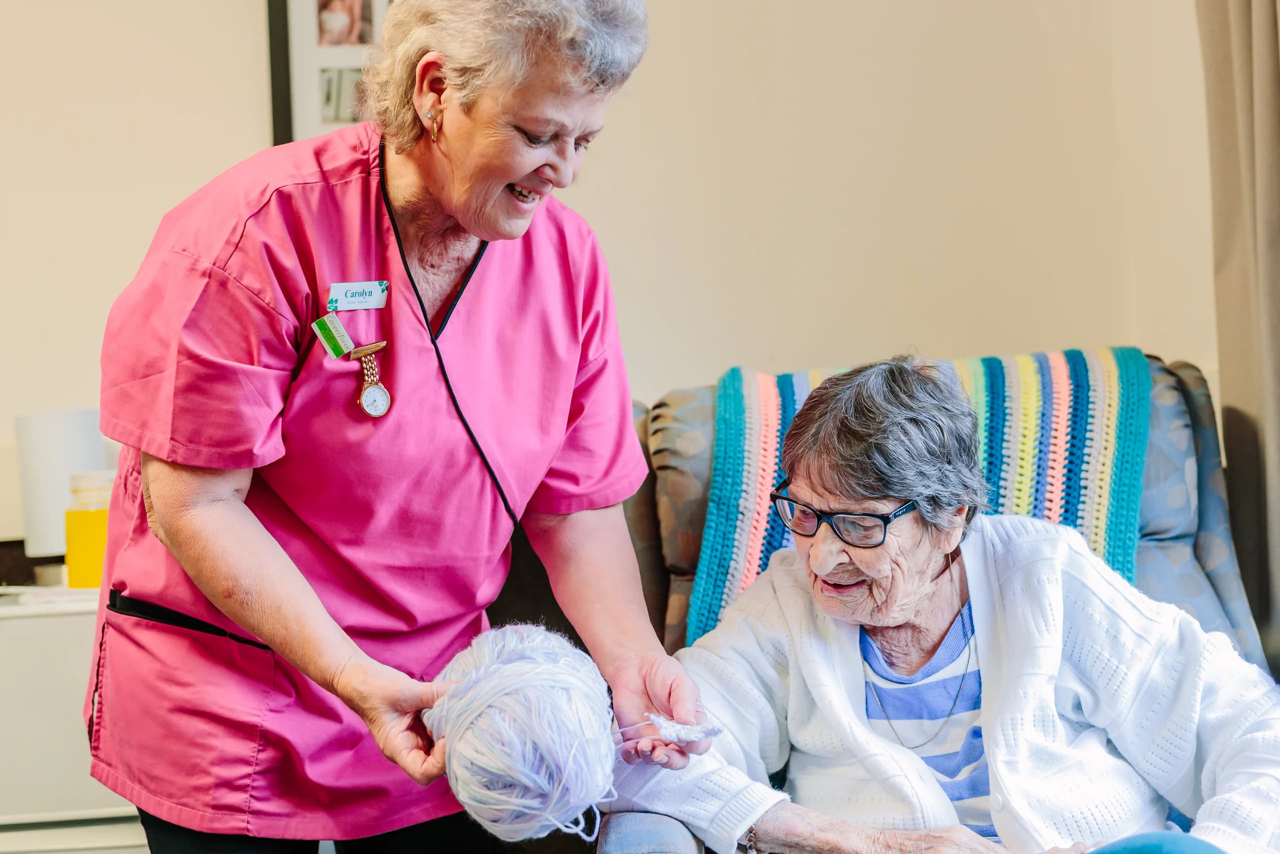 A team member spending time with a resident