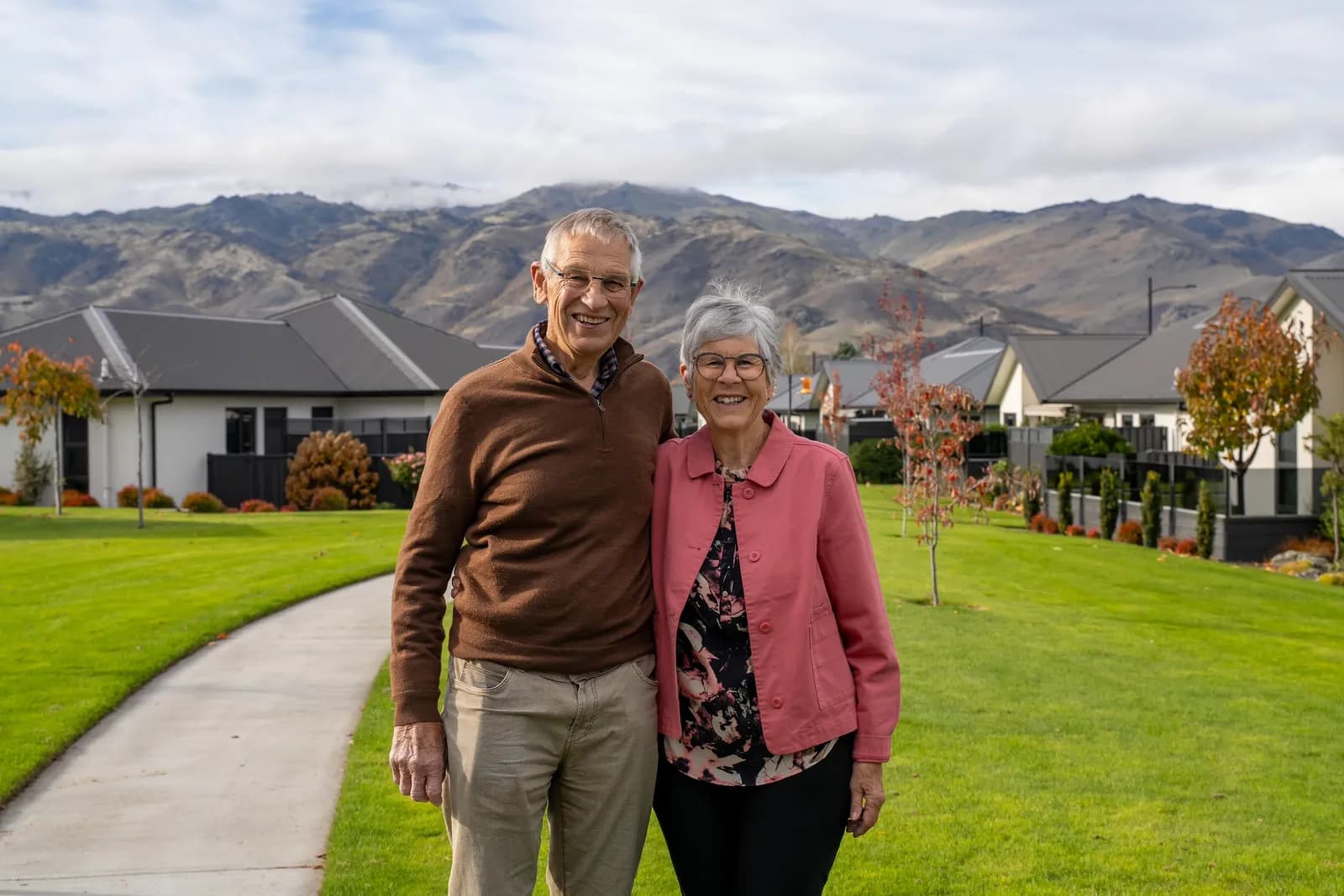 Golden View residents walking through the landscaped village