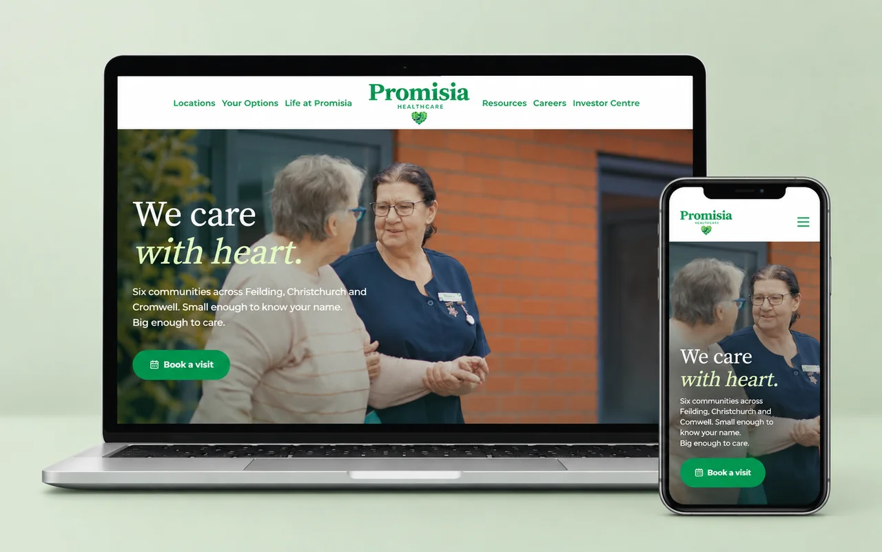 The Promisia homepage displayed on a laptop and phone