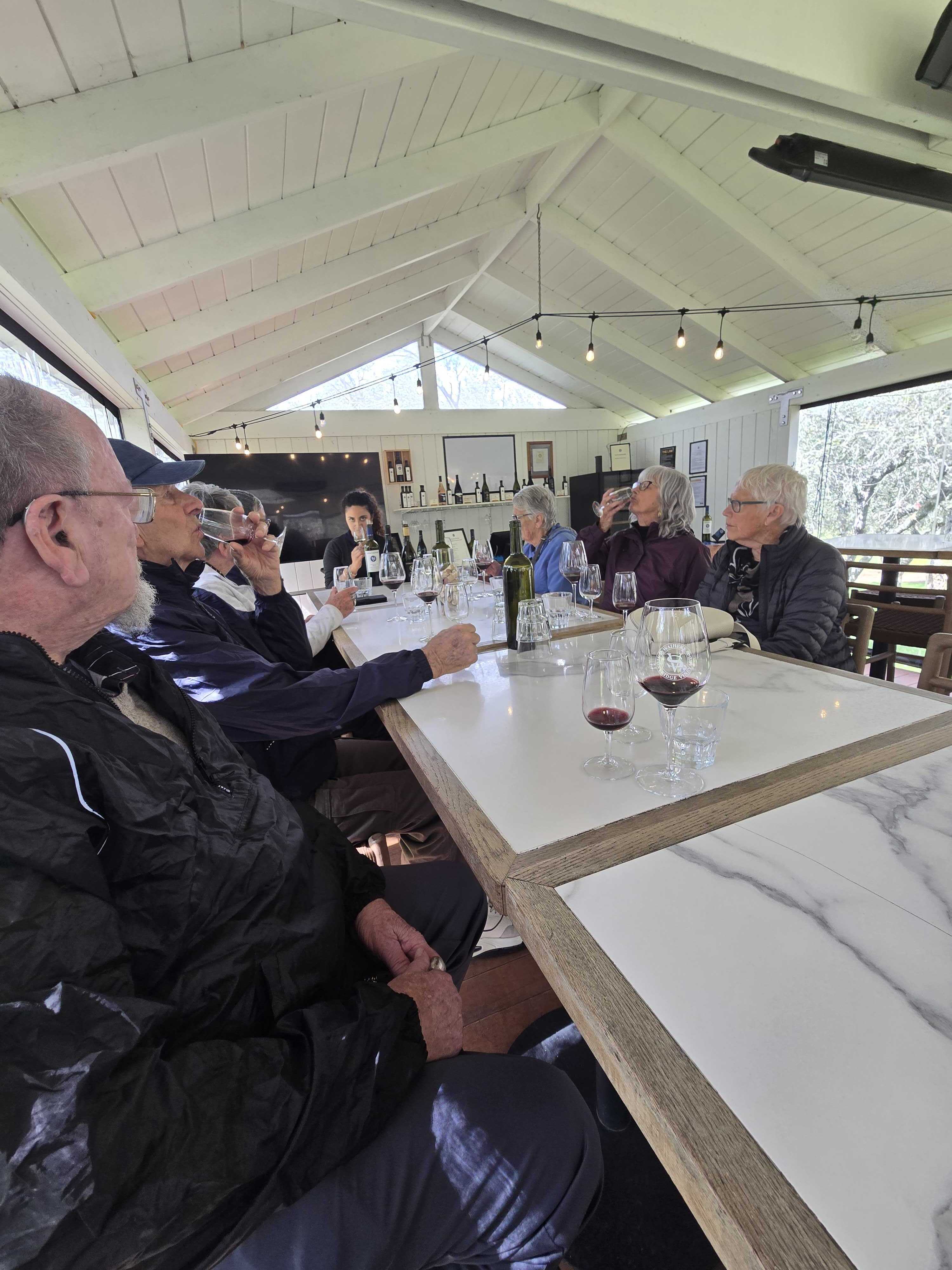 The group enjoying a guided wine tasting